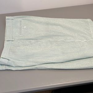 Men’s green and white pinstripe shorts